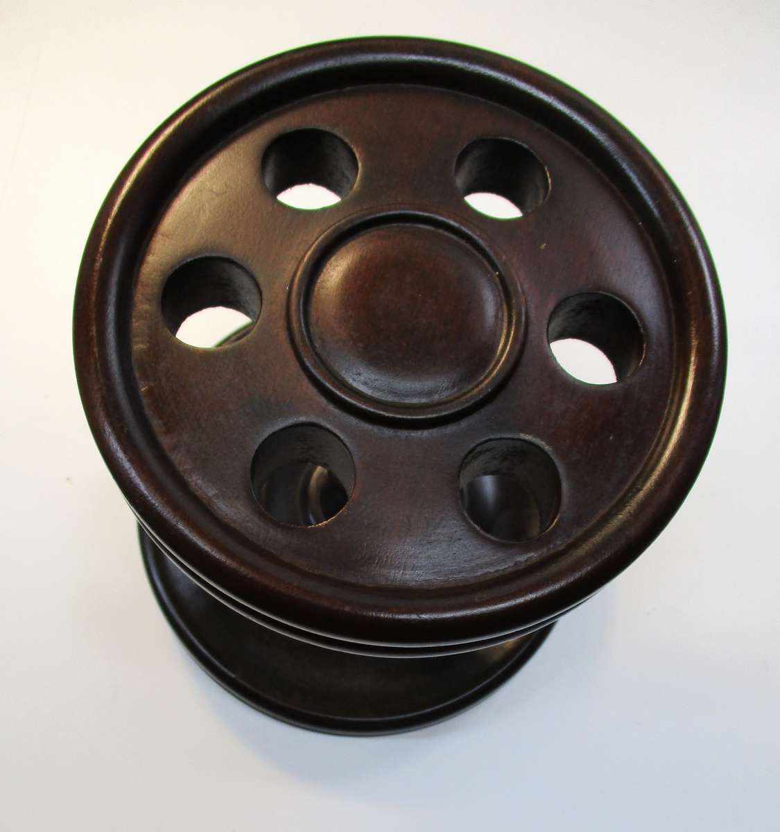 Old solid wood pipe stand for six pipes