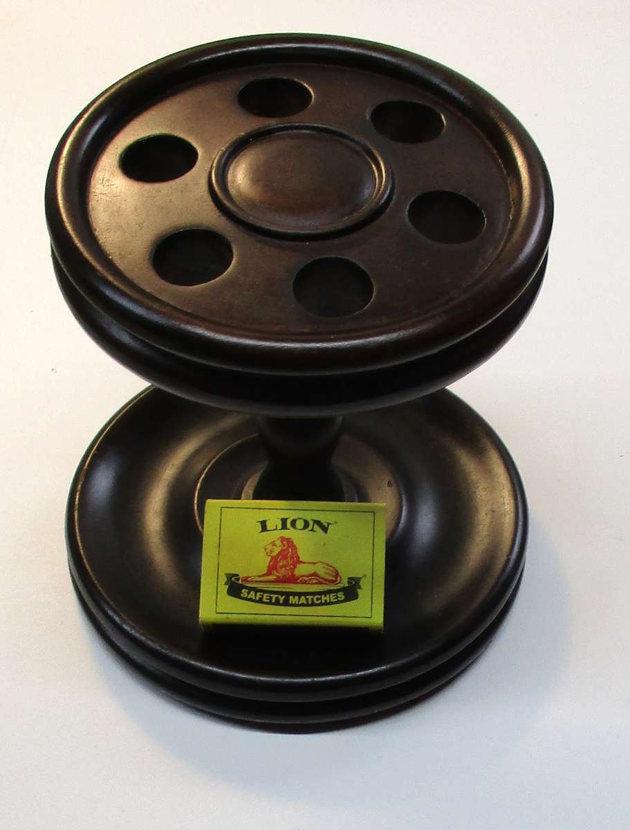 Old solid wood pipe stand for six pipes