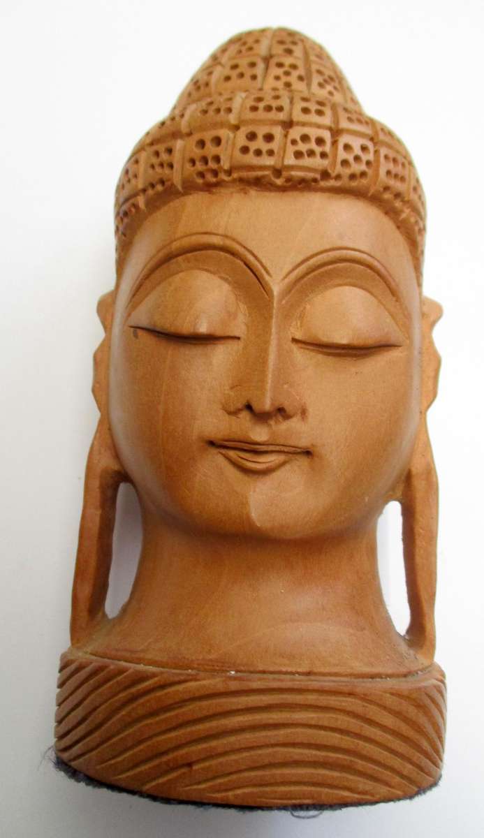 Hand carved wooden Buddha Head