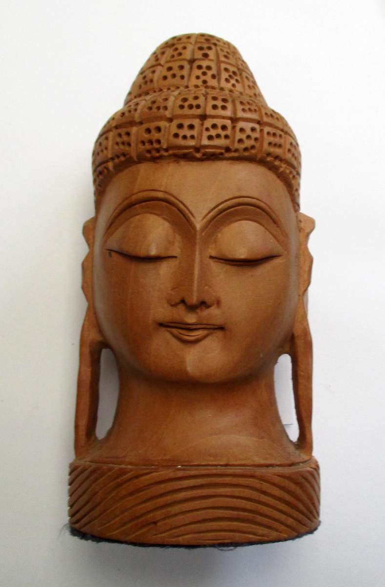 Hand carved wooden Buddha Head