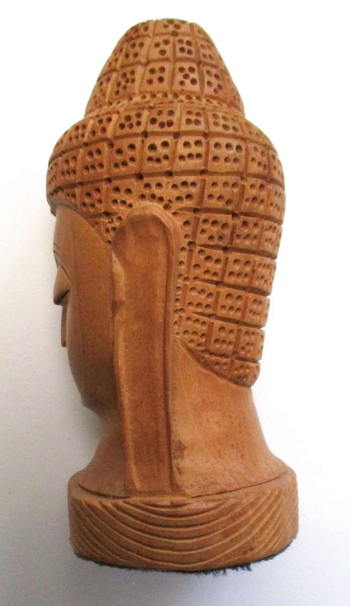 Hand carved wooden Buddha Head