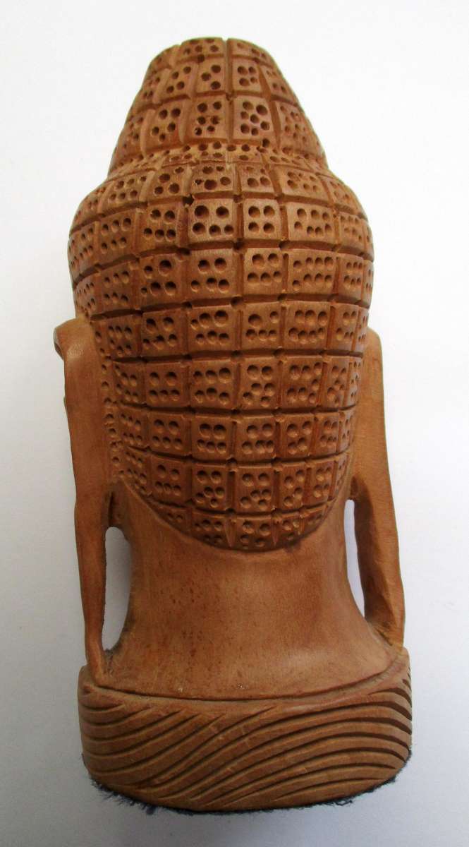 Hand carved wooden Buddha Head