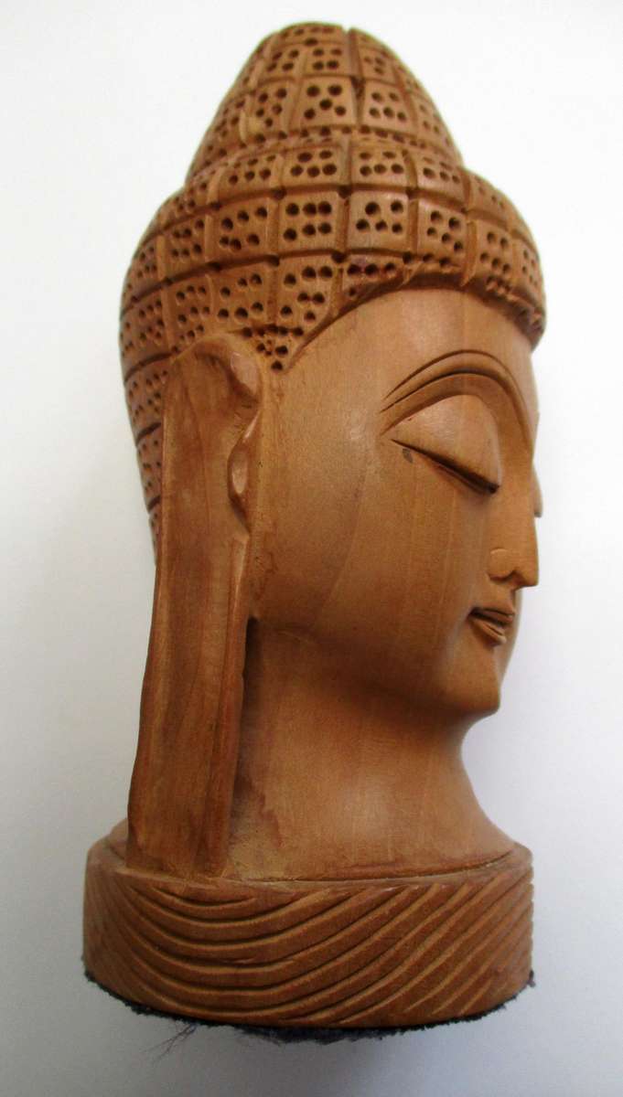 Hand carved wooden Buddha Head