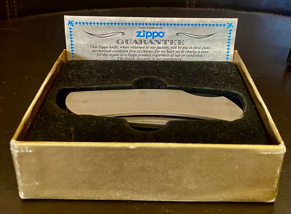 Genuine Zippo collectable folding pocket knife in original box with papers