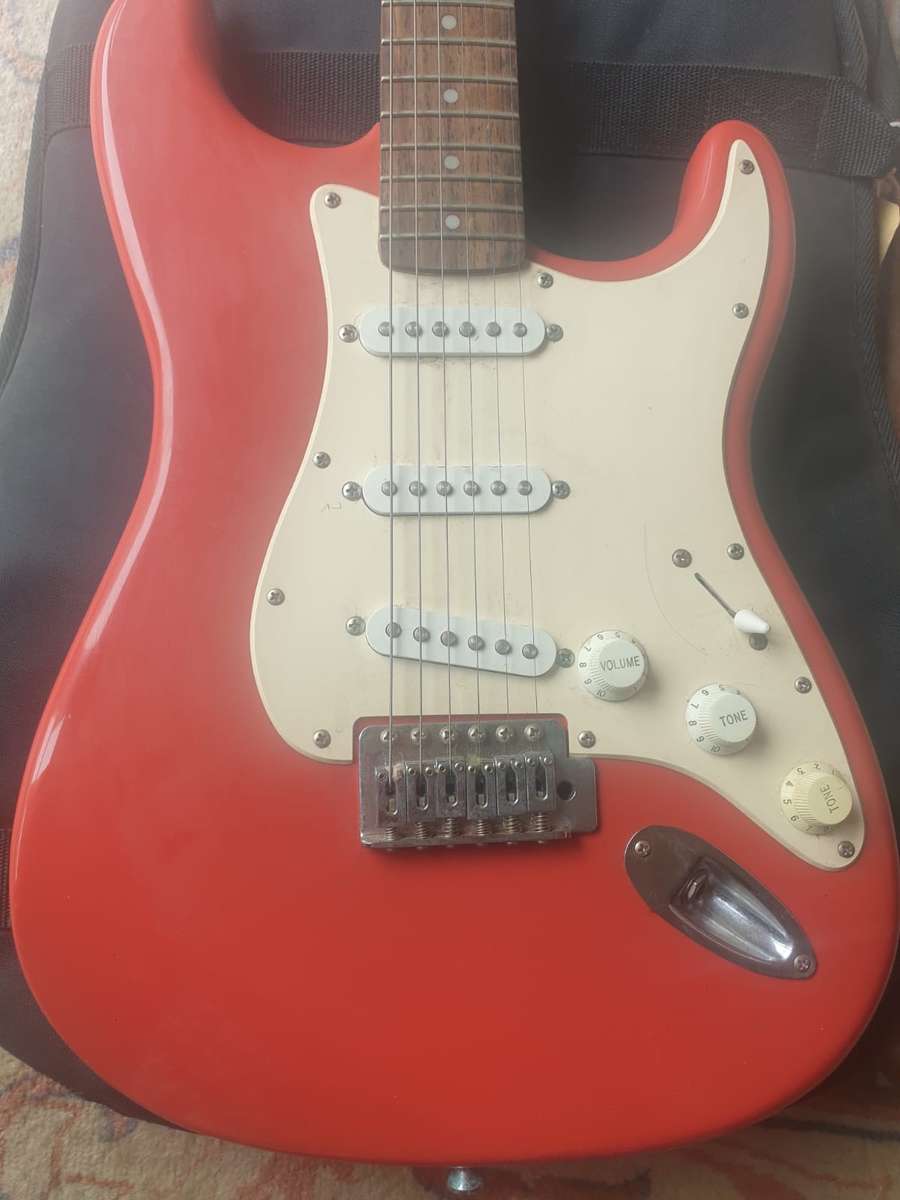Fender Squire Bullet electric guitar with bag made in Indonesia, Red and white