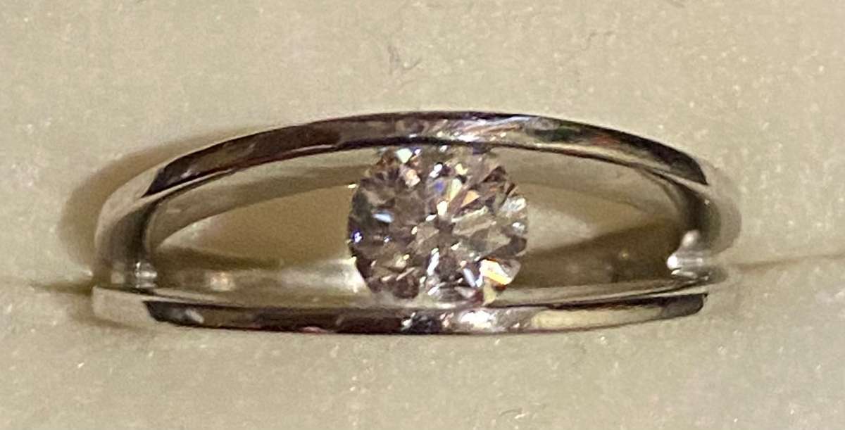 Platinum and 0.44 carat genuine Diamond solitaire Ring