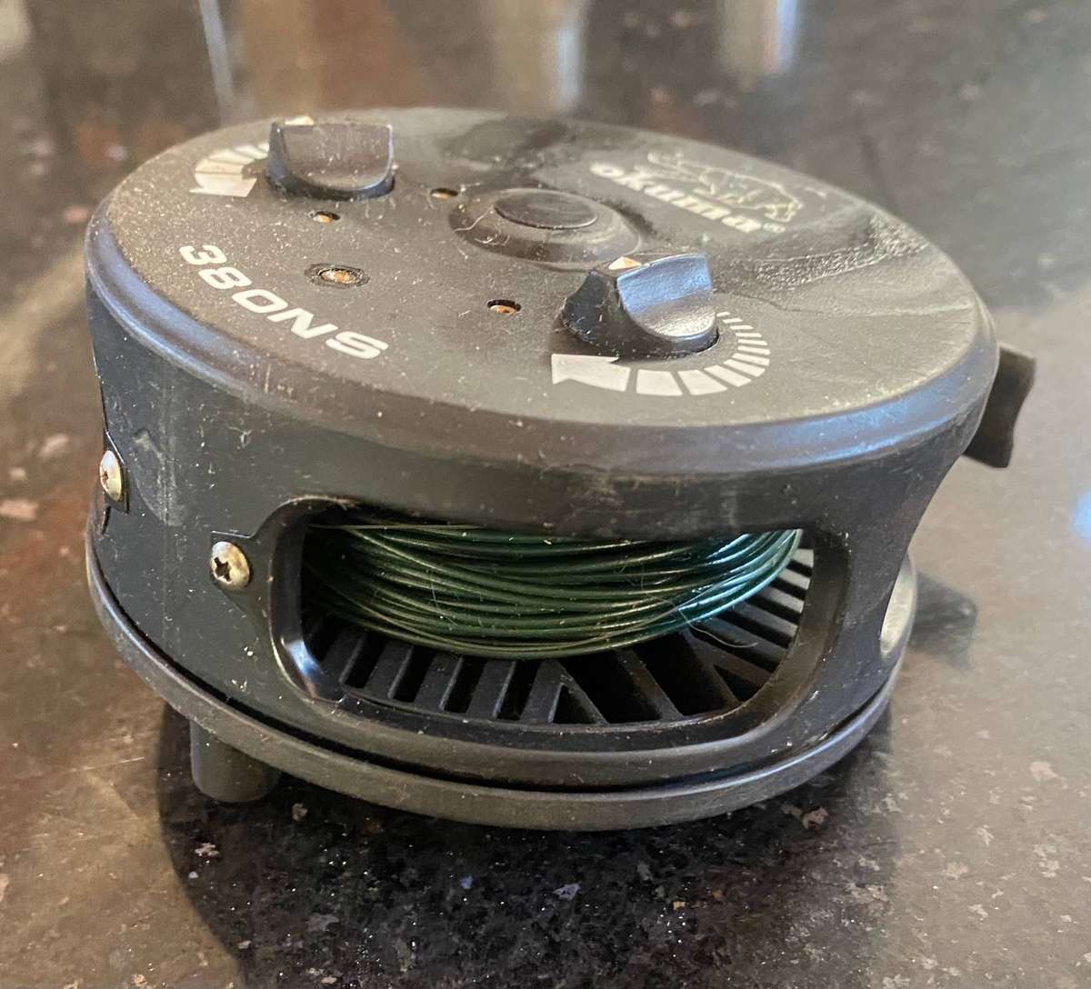 Okuma 380NS fly reel with fly line and flies