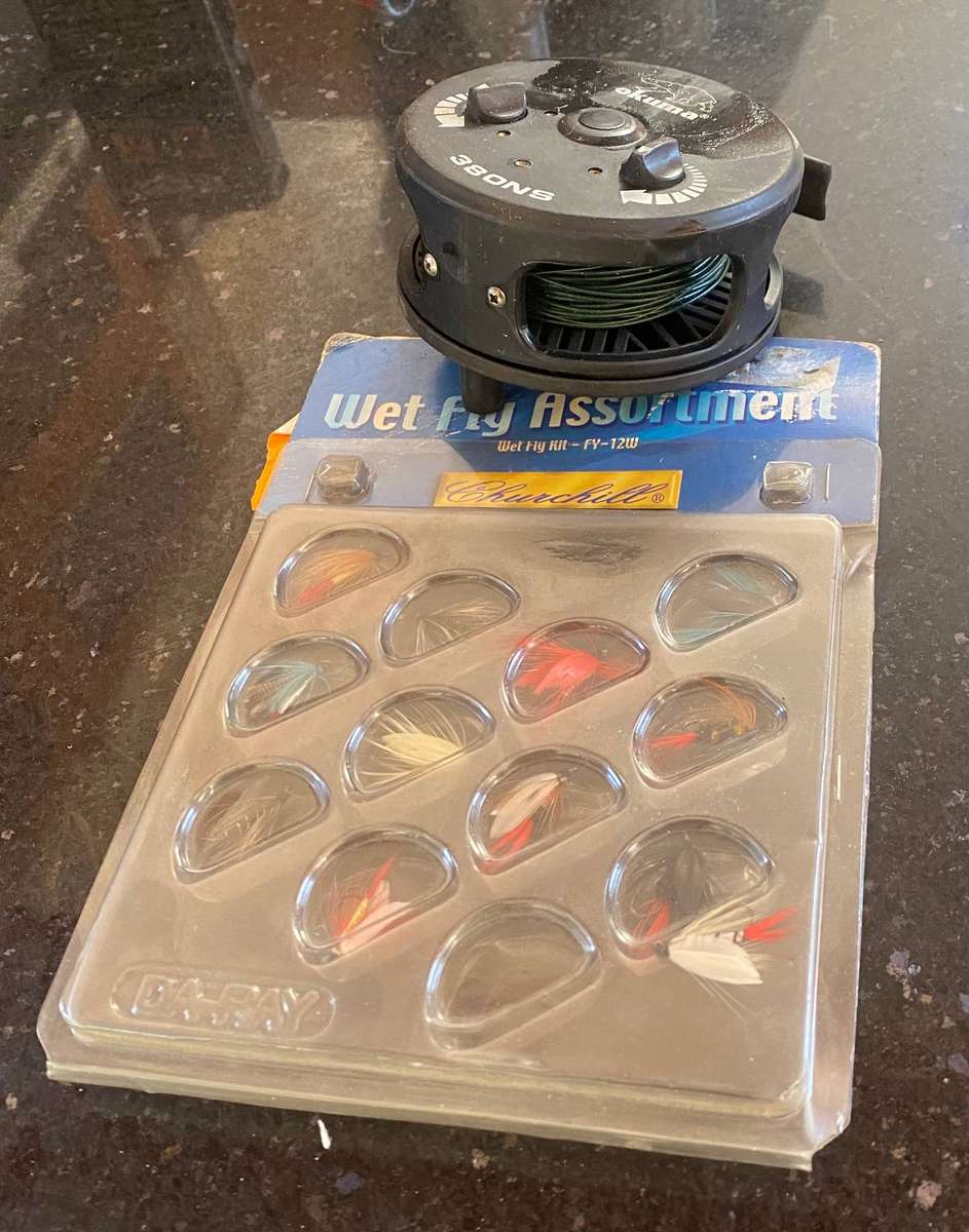 Okuma 380NS fly reel with fly line and flies