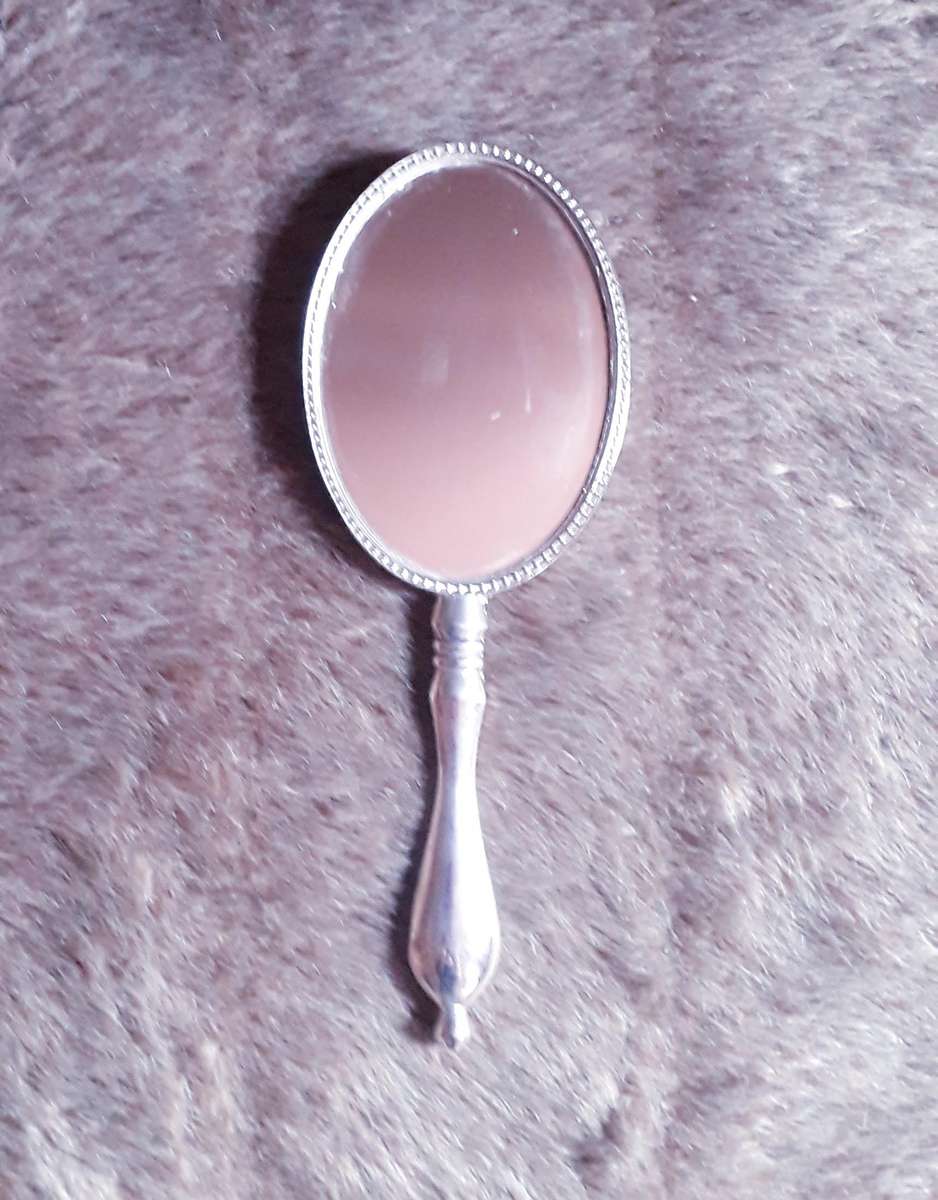 Hand held Mirror