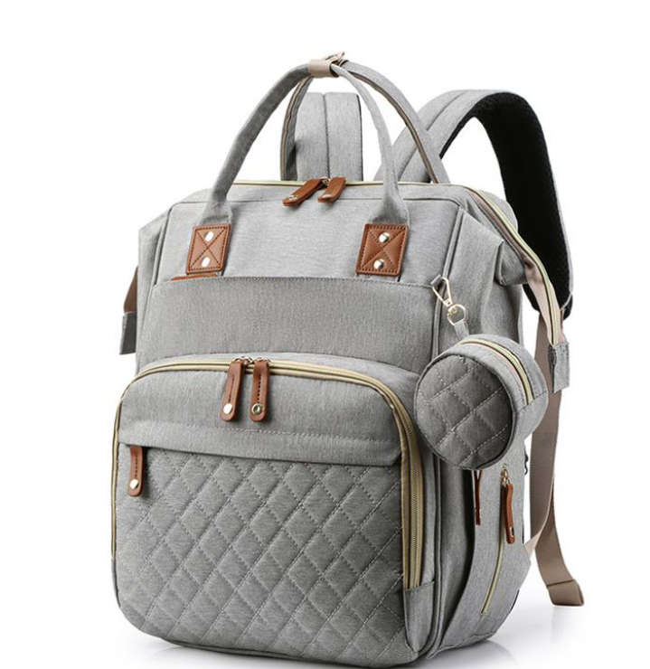 Multi-functional baby diaper bag & Bed