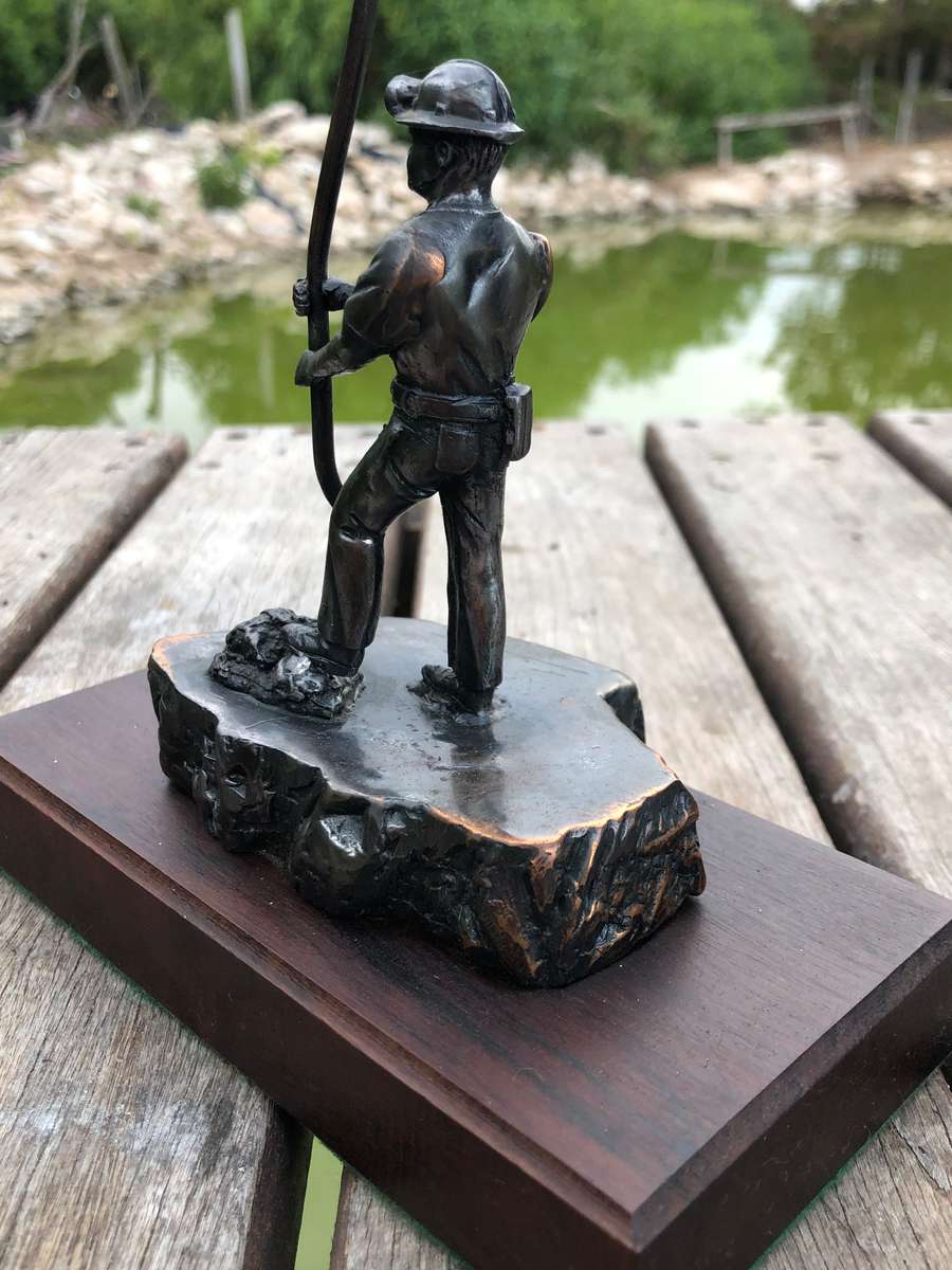 Awesome Bronzed metal miners statue mounted to mahogany base from Wildebeestfontein mine