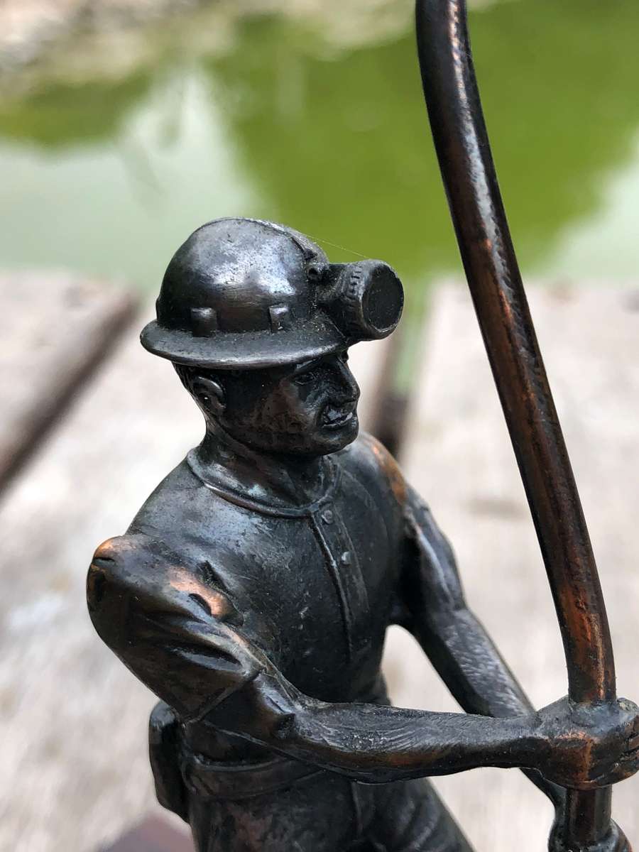 Awesome Bronzed metal miners statue mounted to mahogany base from Wildebeestfontein mine