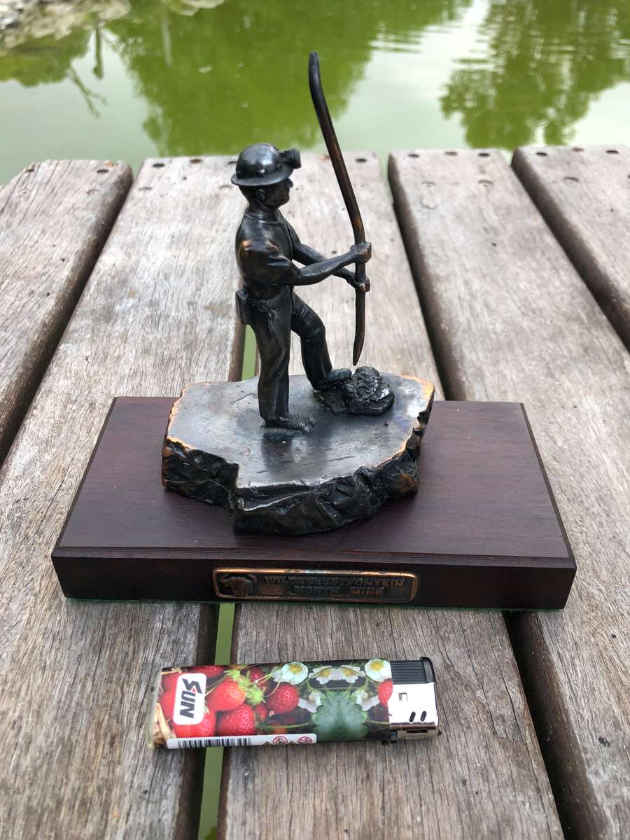 Awesome Bronzed metal miners statue mounted to mahogany base from Wildebeestfontein mine