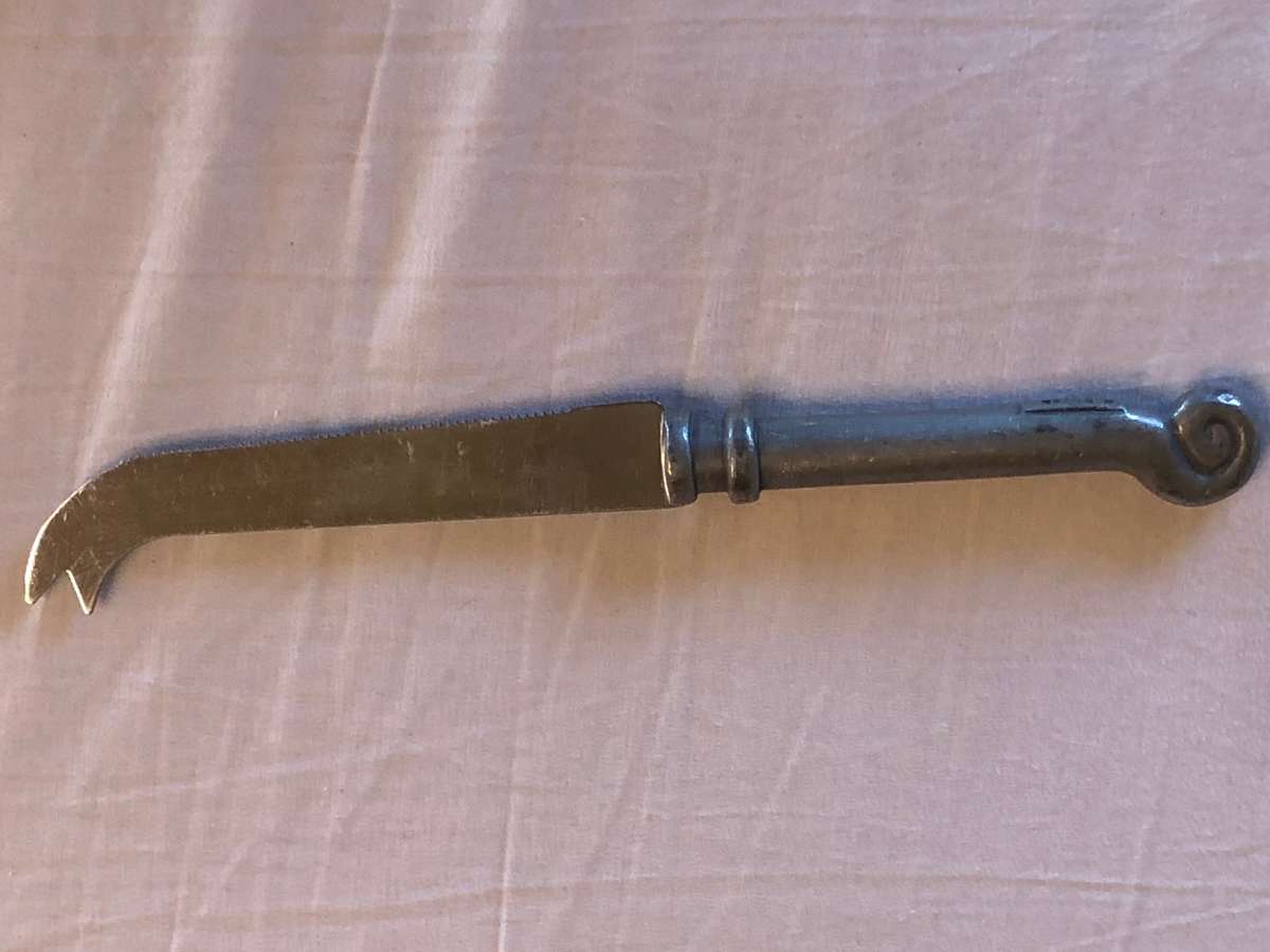 Carrol Boyes coil pattern cheese knife -  serrated blade