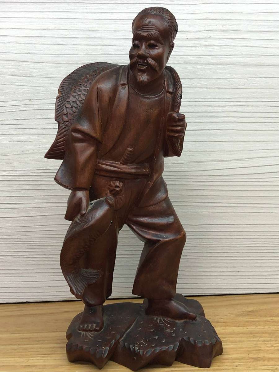 Antique carved Chinese rosewood figure of a fisherman - c19th C