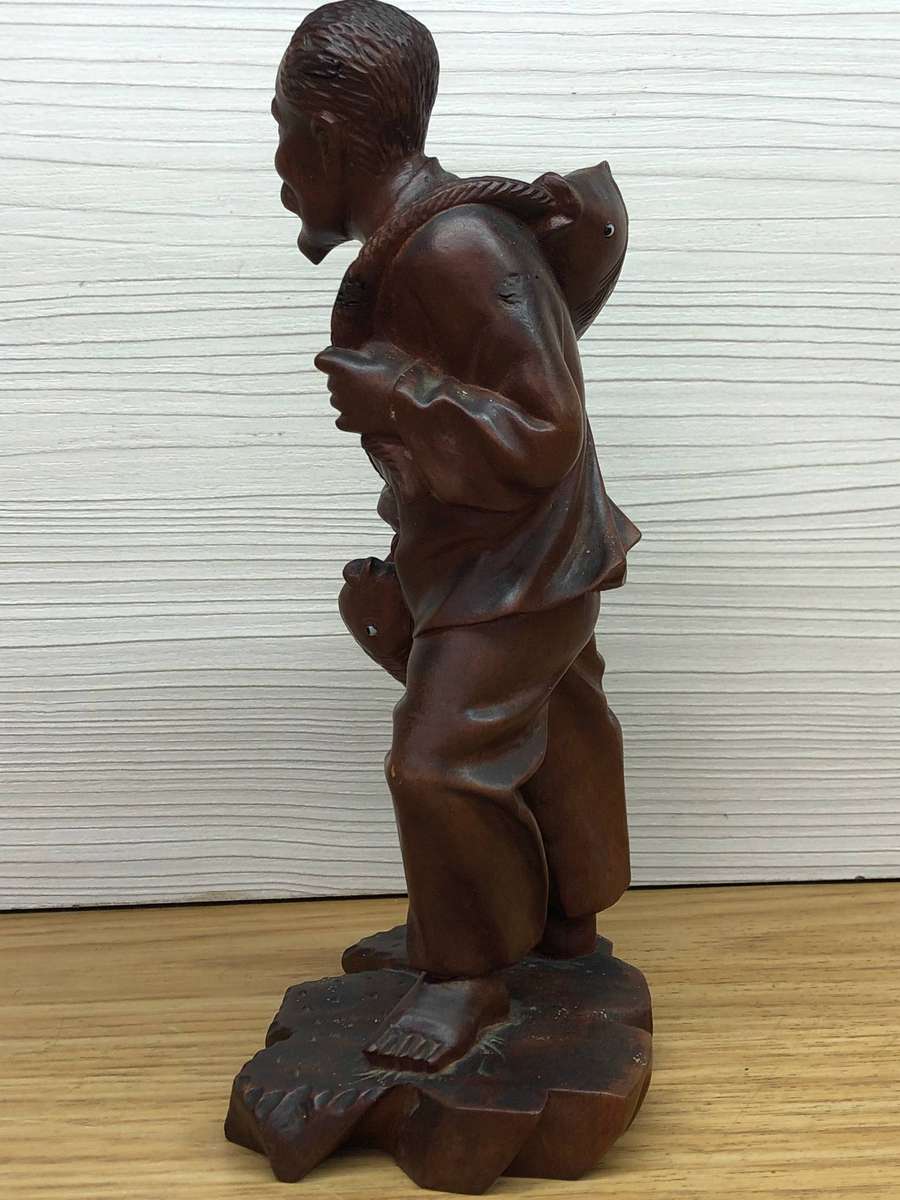 Antique carved Chinese rosewood figure of a fisherman - c19th C
