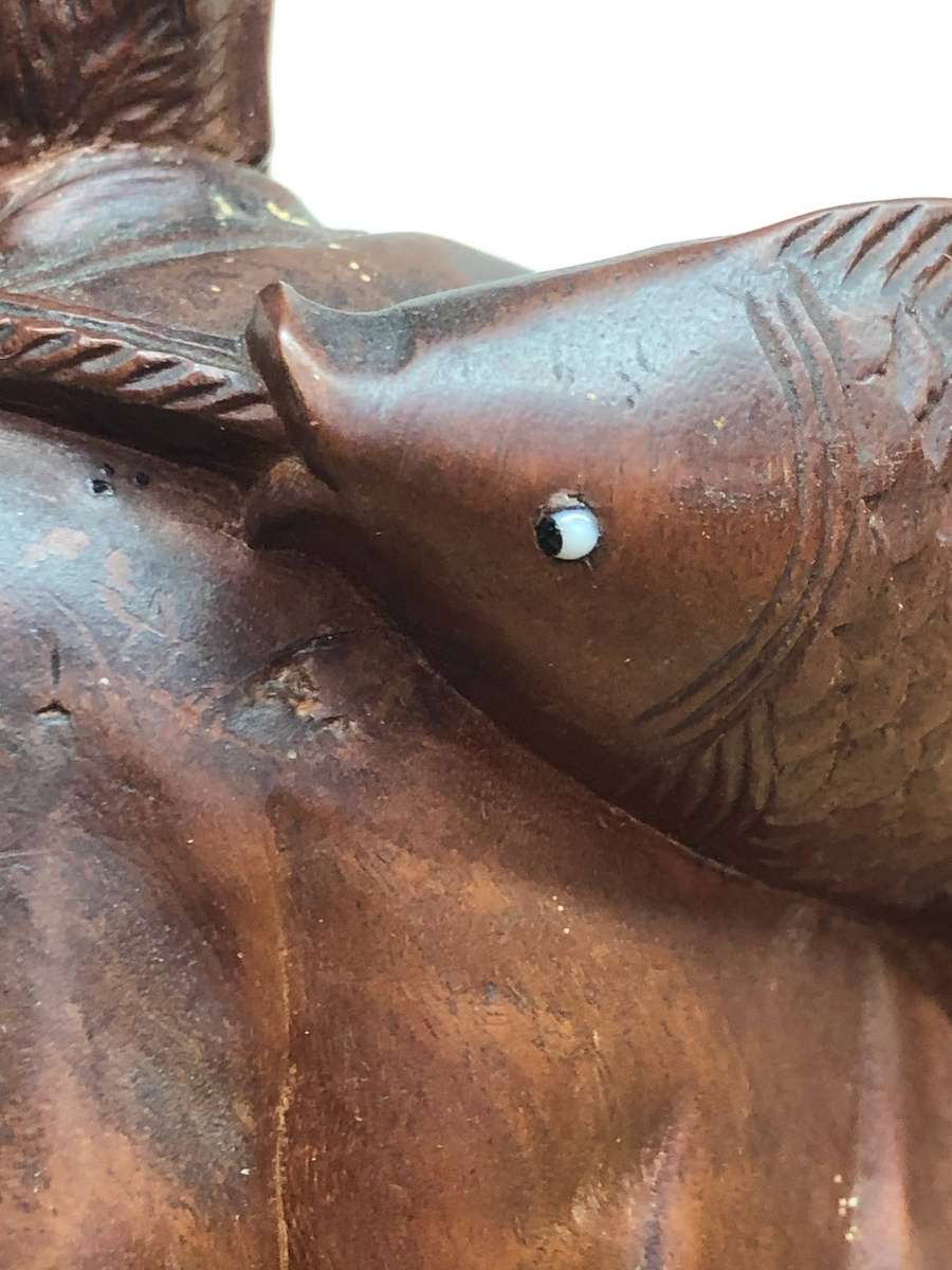 Antique carved Chinese rosewood figure of a fisherman - c19th C