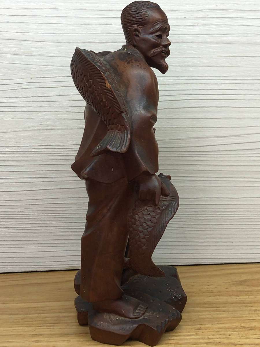Antique carved Chinese rosewood figure of a fisherman - c19th C