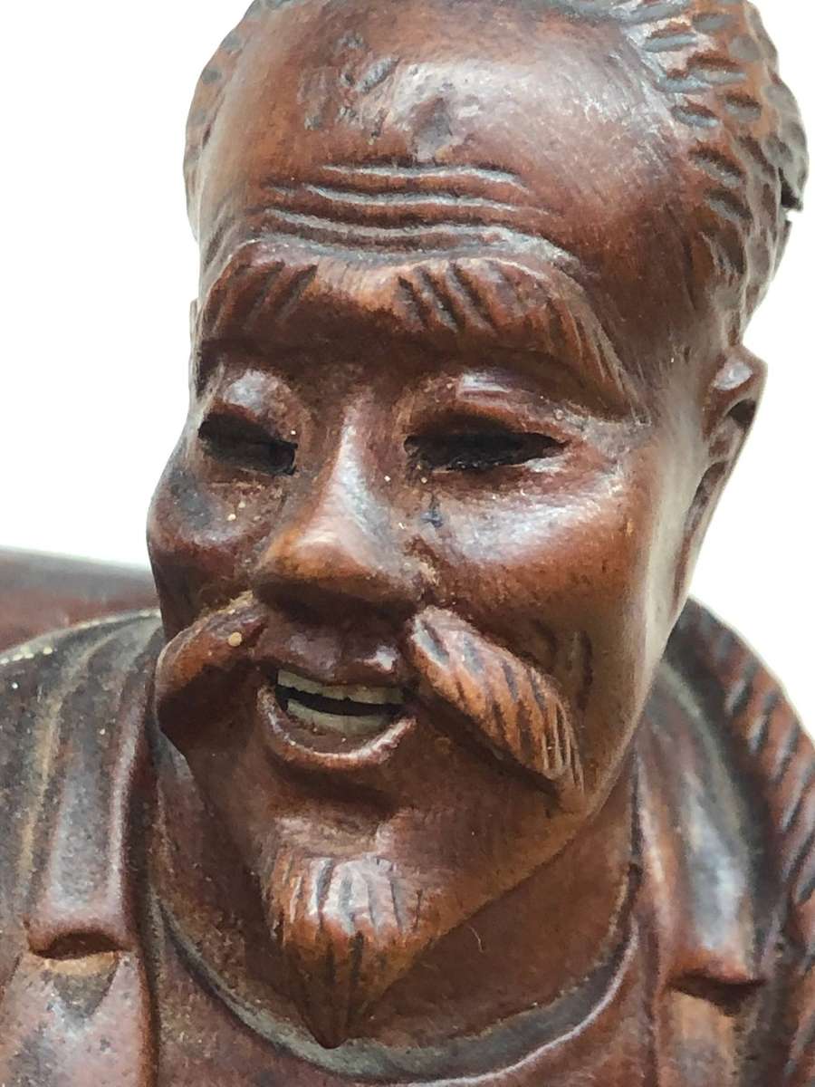 Antique carved Chinese rosewood figure of a fisherman - c19th C
