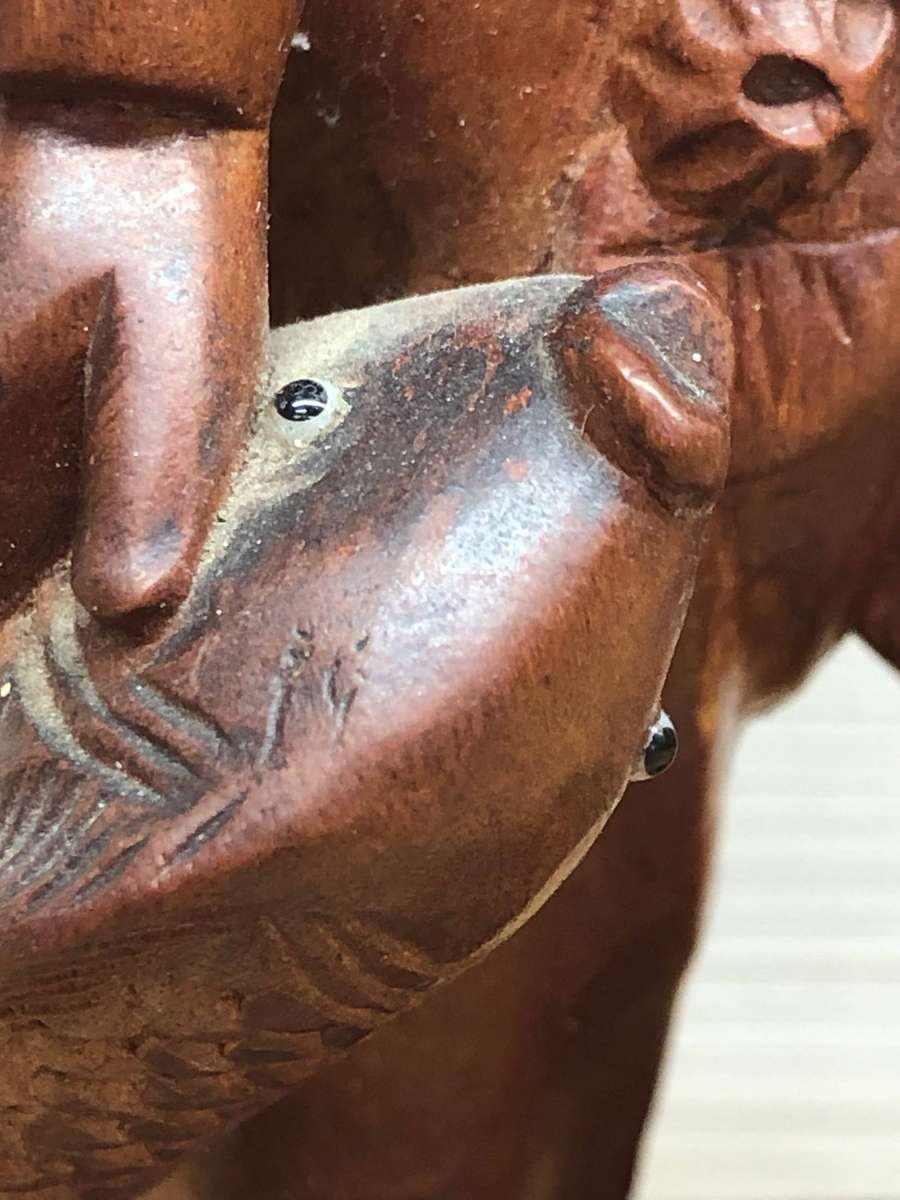 Antique carved Chinese rosewood figure of a fisherman - c19th C