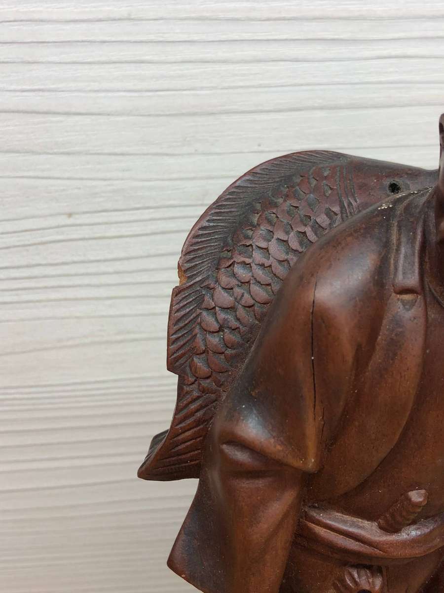 Antique carved Chinese rosewood figure of a fisherman - c19th C