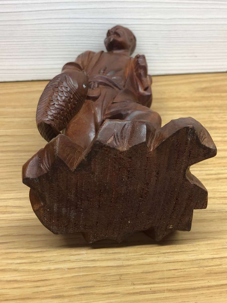 Antique carved Chinese rosewood figure of a fisherman - c19th C