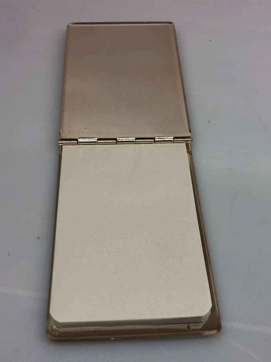 Interesting lot of item , small hand mirror , note pad and a coin purse