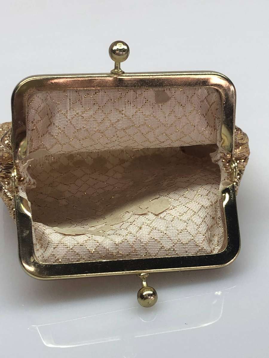 Interesting lot of item , small hand mirror , note pad and a coin purse