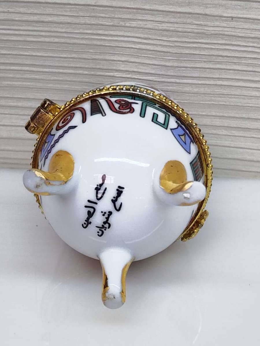 Limoges decorative porcelain opening egg on tripod feet - hand painted