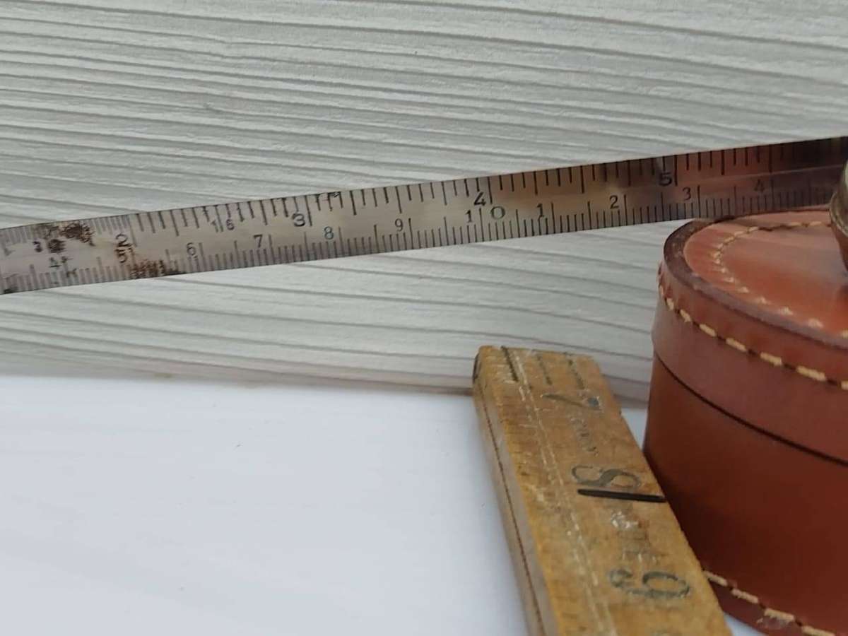 Rabone boxwood and brass folding carpentry ruler No 1167 and a vintage Eidesco measuring tape