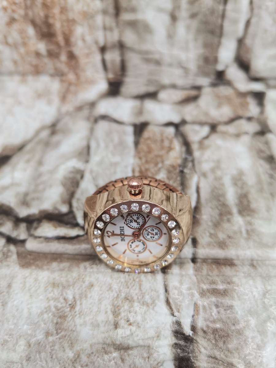 NEW TREND ---FINGER WATCH WITH STRECH BAND--ONE SIZE FITS ALL ROSE GOLD COLOR
