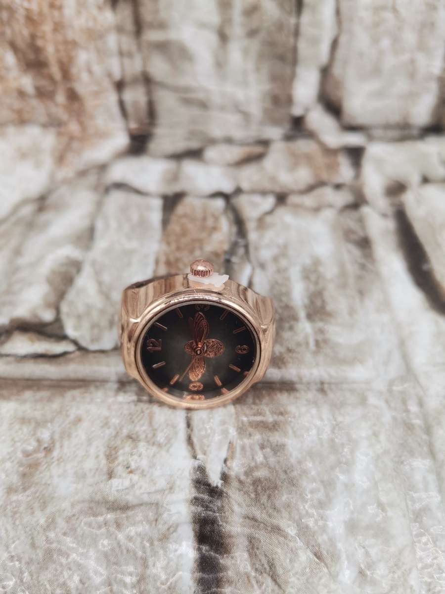 NEW TREND ---FINGER WATCH WITH STRECH BAND--ONE SIZE FITS ALL  ROSE GOLD-BLACK FACE