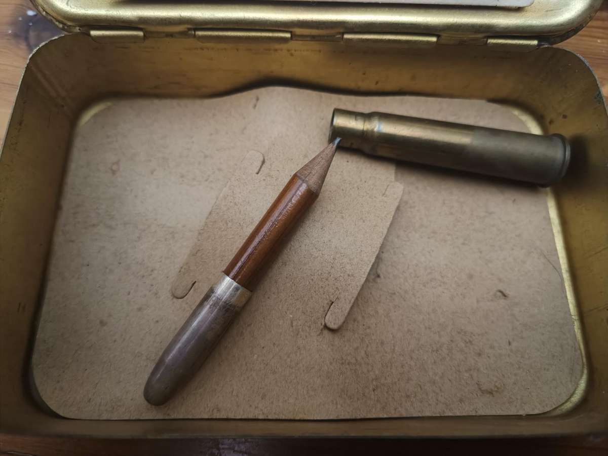 WW1 CHRISTMAS TIN WITH BULLET PENCIL - VG CONDITION