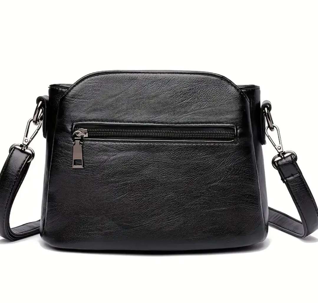 Black shoulder sling handbag