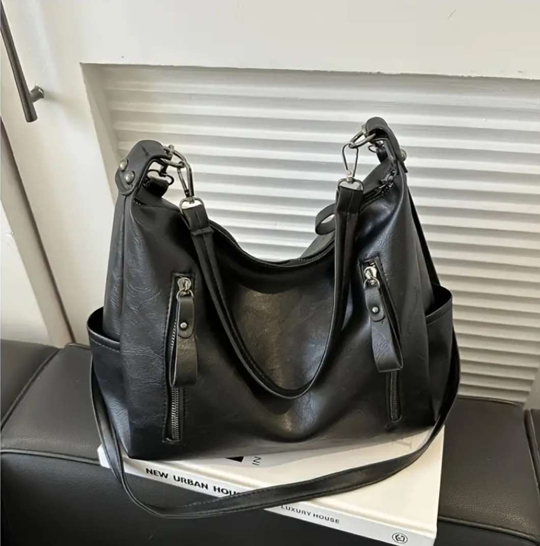 Beautiful Woman's black handbag