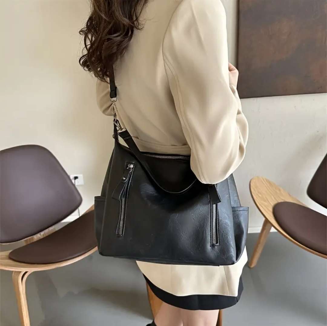 Beautiful Woman's black handbag