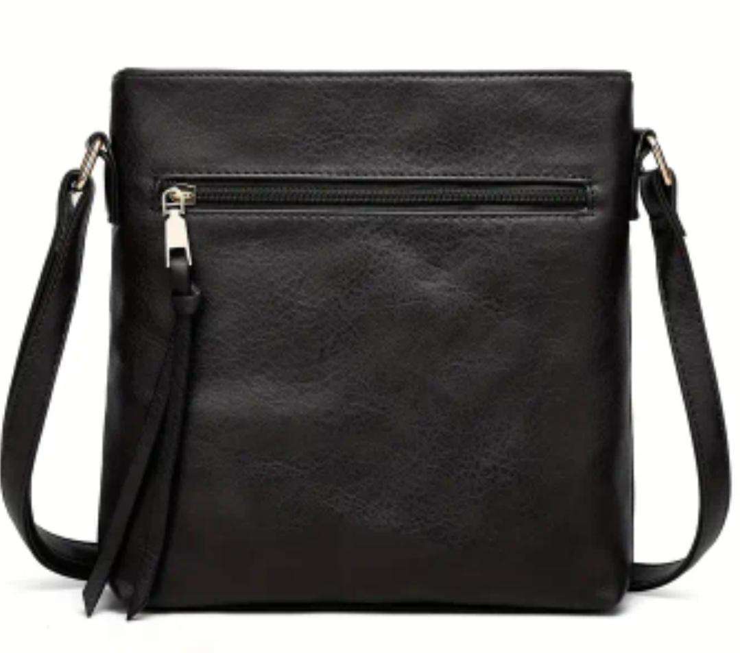 Black shoulder sling or cross body handbag