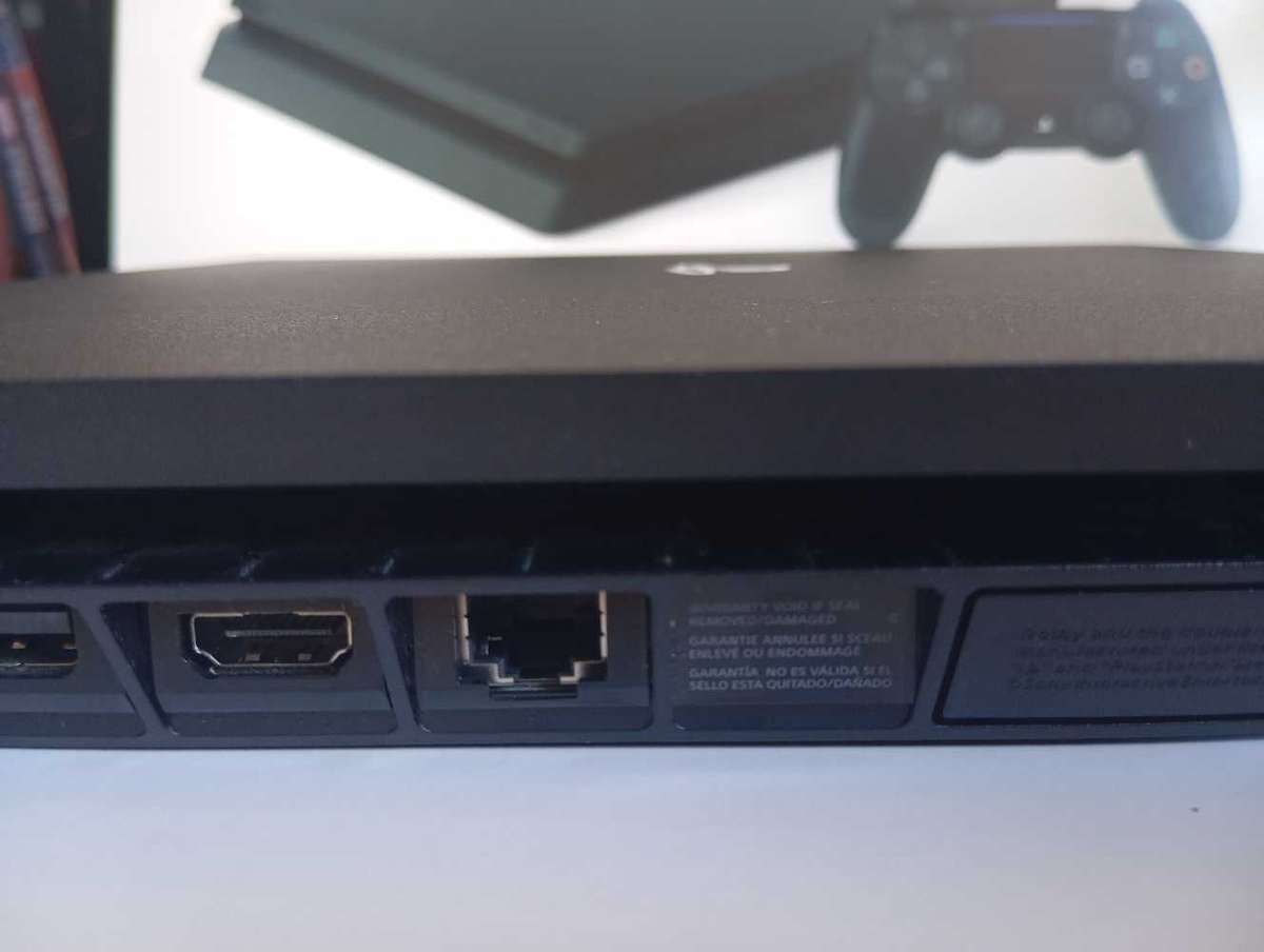 PlayStation 4 Slim (PS4) with Upgraded 1TB SSD Fast Loading Includes Spider-Man & God of War