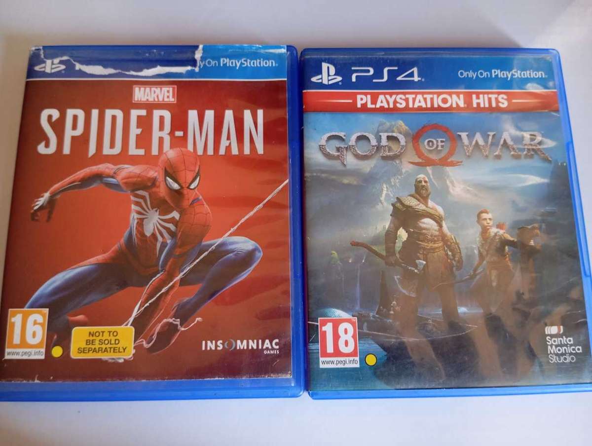 PlayStation 4 Slim (PS4) with Upgraded 1TB SSD Fast Loading Includes Spider-Man & God of War