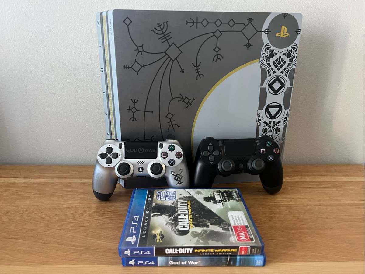 PS4 Pro 1TB  God of War Limited Edition Bundle 2 Games + 2 Controllers