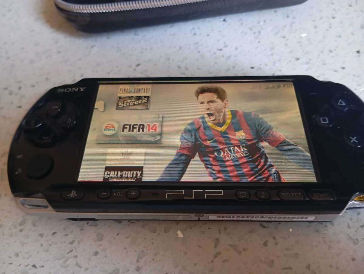 PSP 3004 loaded with over 40 games