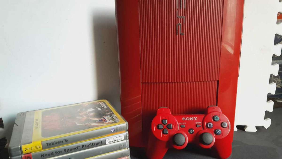 PS3 Red Limited Edition 1TB Excellent Condition + 5 great games