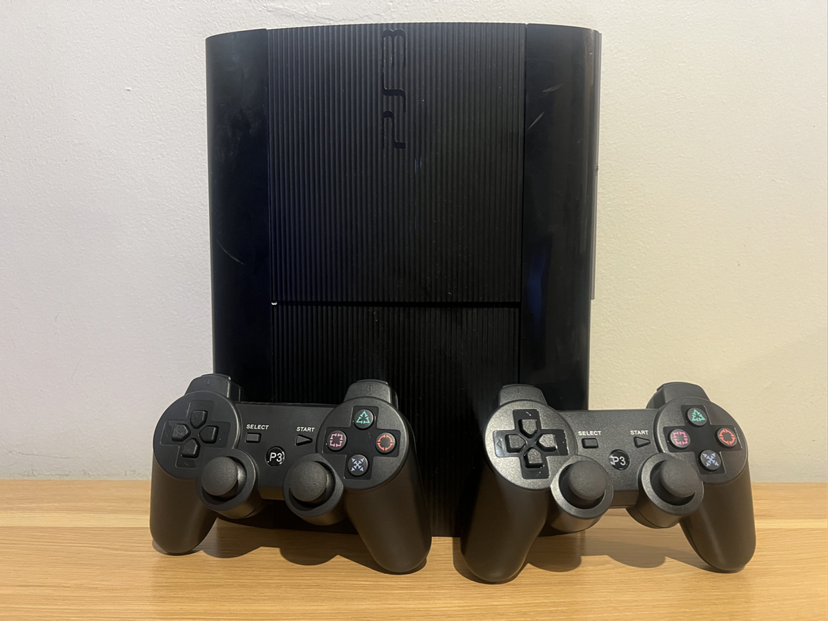 PlayStation 3 Super Slim 500GB (PS3) Loaded with 50+ Games + 2 Controllers