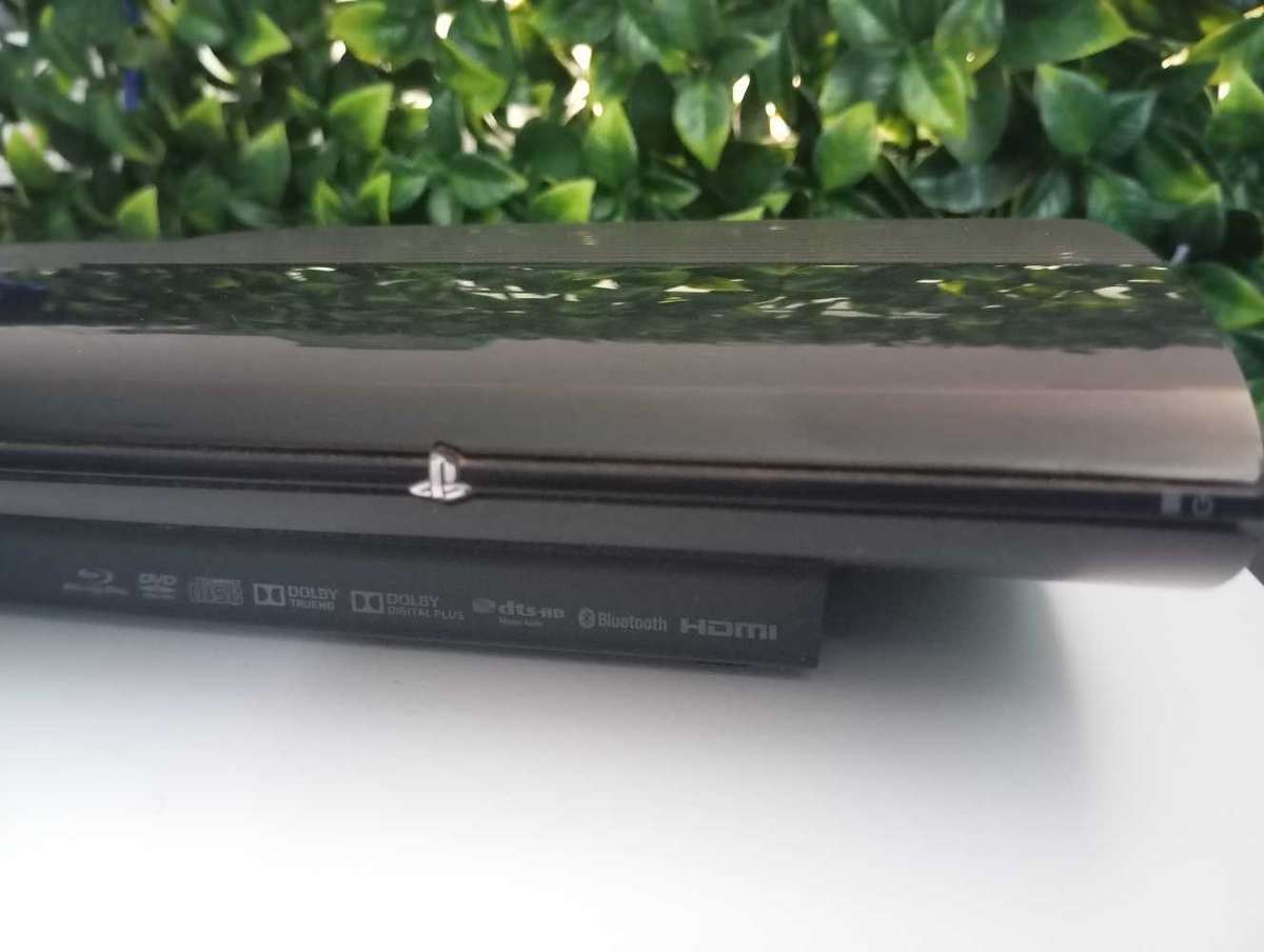 PS3 500GB SUPER SLIM CONSOLE + 5 GAMES VERY GOOD CONDITION FAST SHIPPING