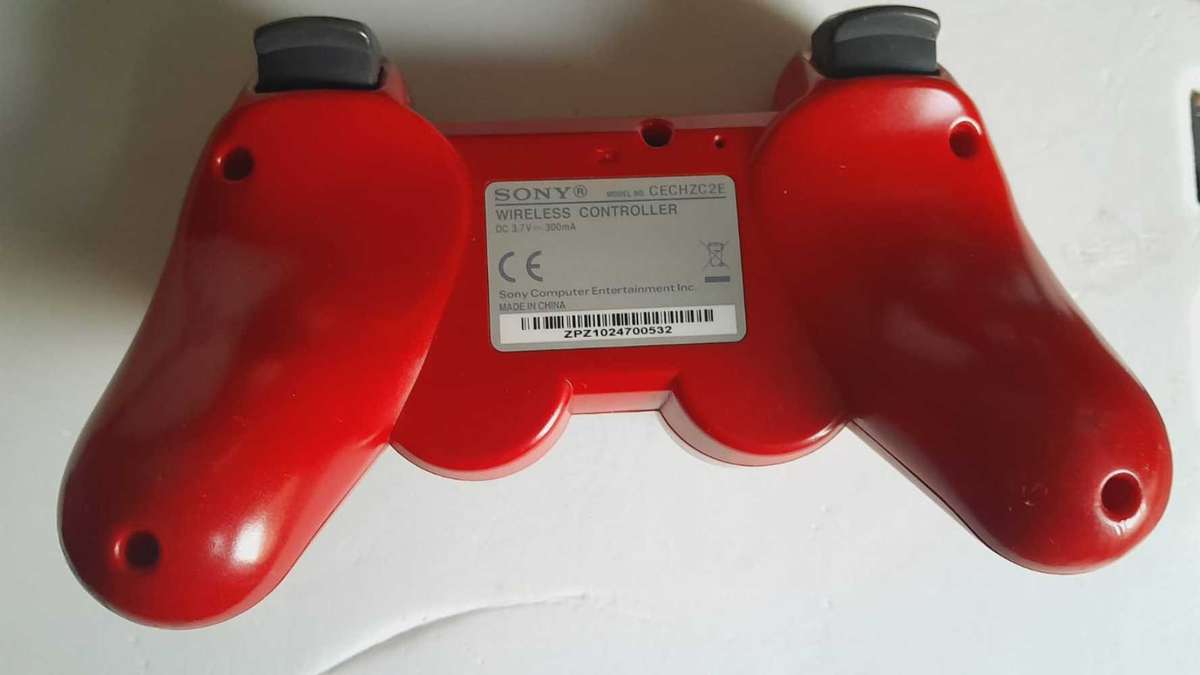 PS3 Red Limited Edition 1TB Excellent Condition + 5 great games