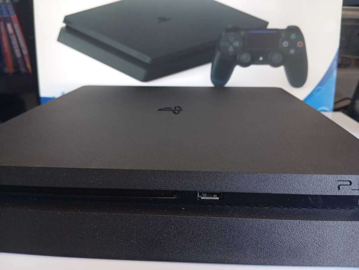 PlayStation 4 Slim (PS4) with Upgraded 1TB SSD Fast Loading Includes Spider-Man & God of War