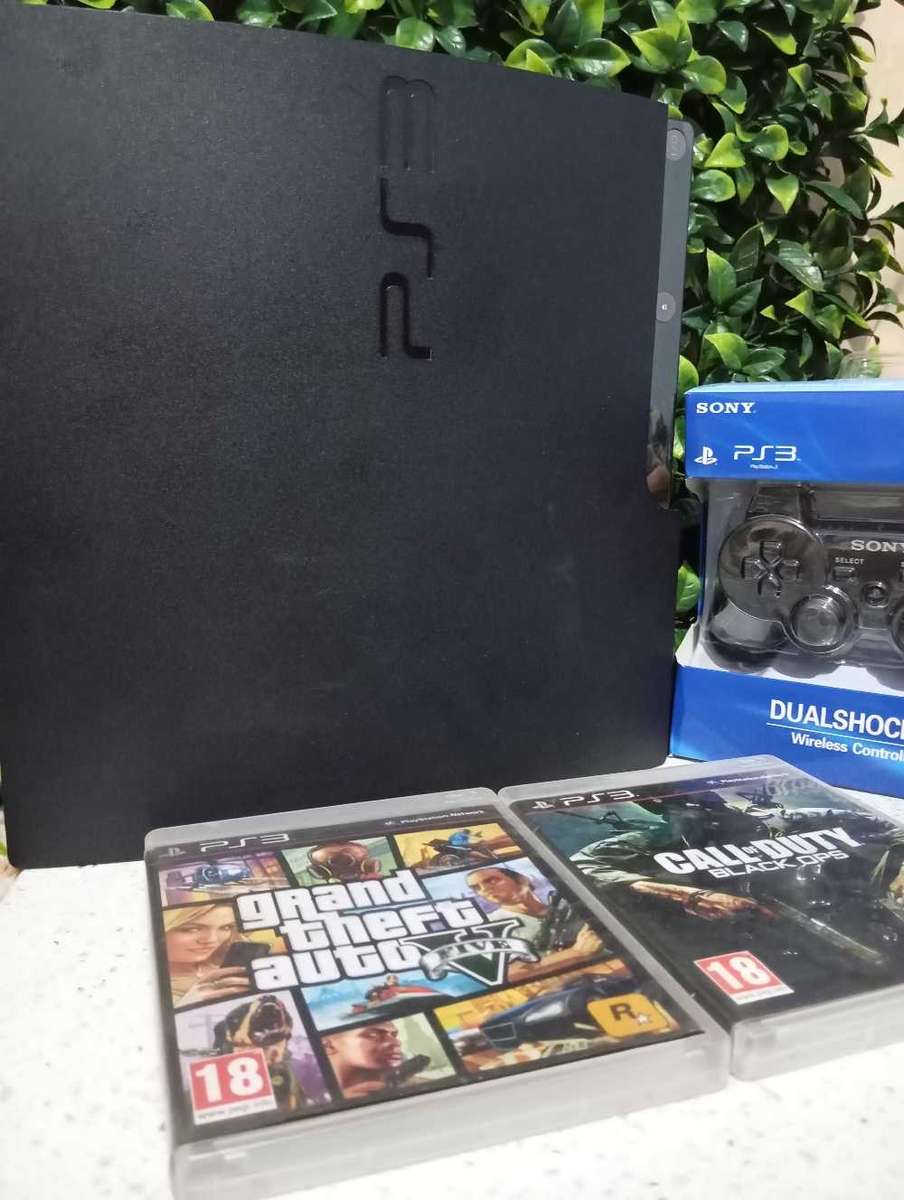 PS3 slim 1tb + 2 games