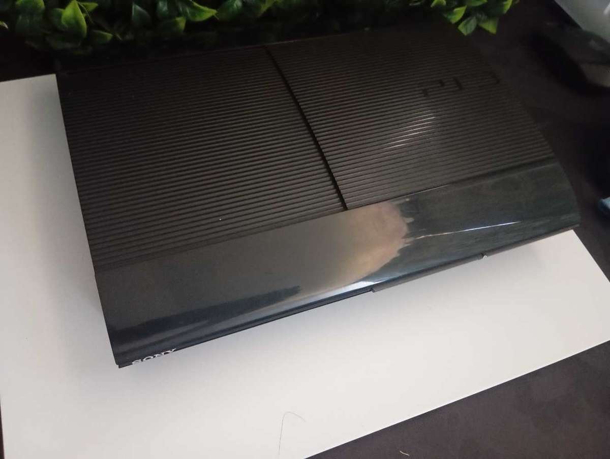 PS3 500GB SUPER SLIM CONSOLE + 5 GAMES VERY GOOD CONDITION FAST SHIPPING