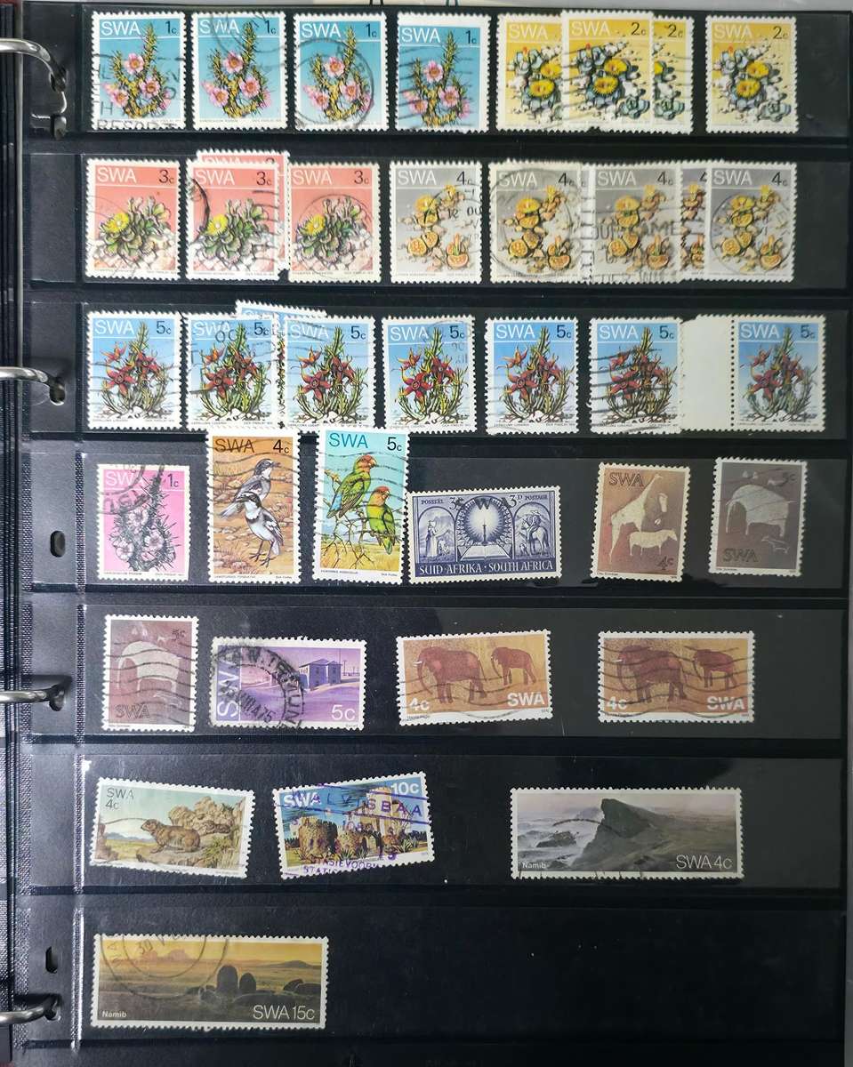 Protector Stamp File: 20 Pages with Unchecked World Mix - Used