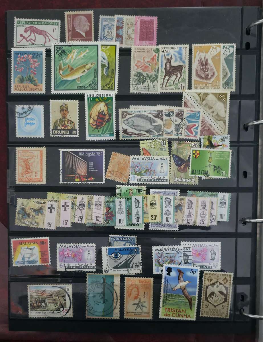 Protector Stamp File: 20 Pages with Unchecked World Mix - Used